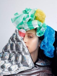 a woman with plastic wrapped around her head