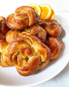 orange cardamoon morning buns on a white plate