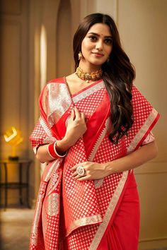 A Red Floral Woven Saree. It has intricate design all over the saree. This saree is a suitable amalgamation of style and grace that is required from an ethnic wear. The saree is ideal for any formal gathering. The saree comes with an unstitched blouse of corresponding color and design as shown in the picture. Fabric Type: Soft Banarasi SilkColor: ﻿RedSaree Length: 6.3 meters including 0.8 meter blouseBlouse Material: Cotton SilkWashing Instructions: Dry Clean Only Banarasi Silk Pre-draped Saree For Puja And Navratri, Red Paithani Silk Pre-draped Saree With Unstitched Blouse, Red Pre-draped Saree With Unstitched Blouse In Paithani Silk, Navratri Banarasi Silk Pre-draped Saree For Puja, Red Paithani Silk Pre-draped Saree For Diwali, Semi-stitched Festive Saree For Puja, Festive Self Design Saree For Diwali, Festive Self-design Saree For Diwali, Red Katan Silk Saree With Unstitched Blouse