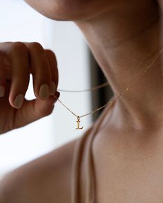 This 14k solid gold initials necklace offers timeless sophistication, perfectly suiting the modern minimalist. Its chic and delicate design adds a personalized touch to any outfit, allowing you to express yourself in a subtle yet meaningful way. Layer it with favorite necklaces for a unique and meaningful statement. Make it yours with a personalized touch. * Initial measures approx. 7mm * 14k yellow gold * Chain Length: 16" or 18" * Leave us your initials and placement in the comment box at chec Minimalist Yellow Gold Initial Pendant Necklace, Elegant Initial Pendant Name Necklace For Everyday, Elegant Everyday Initial Pendant Name Necklace, Minimalist 14k Gold Filled Charm Necklace With Initial Pendant, Minimalist 14k Gold Initials Charm Necklace, Elegant 14k Gold Name Necklace For Everyday, Minimalist Yellow Gold Necklace With Initials, Minimalist Initial Pendant Name Necklace With Delicate Chain, Simple 14k Gold Initial Pendant Necklace