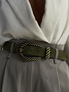 Our famous Off to the Races belt in olive hair-on Italian leather with an old brass buckle 1.25" Sourced in Italy Made in the USA Statment Belt, Vintage Belts With Brass Buckle For Everyday Use, Statement Belts, Unique Belts, Vintage Belt, Classic Vintage Brown Belt With Brass Buckle, Belts Aesthetic, Luxury Vintage Belt With Brass Buckle, Olive Hair