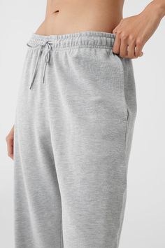 Cool down, warm up — the choice is yours with the Chill Sweatpant. Designed with ultra-soft, breathable French terry and a non-fuzzy, anti-cling interior, this lightweight bottom is made to hang or make moves. Classic cuffed bottoms, external drawcords and side-zippered pockets make this an everyday essential to wear on repeat. Soft, lightweight everyday sweatpant For working out and wearing out Designed & uniquely fit for every size Wear-tested by our in-house team for the perfect fit Woman Back, Back Women, On Repeat, Alo Yoga, Knit Set, French Terry, Everyday Essentials Products, Heather Grey, Shopping Outfit