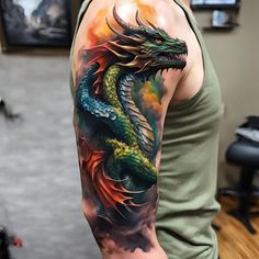 a man with a dragon tattoo on his arm