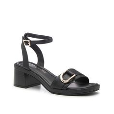 Kelly & Katie-Tesimay Sandal Add a modern touch to staple! The Tesimay sandal from Kelly & Katie features a classic silhouette but is upgraded by a stylish square toe, a block heel, and a metallic detail. Modern Open Heel Heels With Buckle Closure, Modern Block Heels With Buckle Closure For Spring, Spring Block Heels With Buckle Closure, Modern Synthetic Sandals With Block Heel, Modern Synthetic Ankle Strap Block Heels, Modern Ankle Strap Block Heels, Modern Synthetic Block Heels With Ankle Strap, Synthetic Block Heels With Buckle Closure, Modern Open Toe Block Heels With Buckle