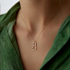 14K Solid Gold Cat Necklace - Dainty Unique Kitty Shaped Pendant - Sitting Cat Necklace - Delicate Kitten Charm - Cute Cat Pendant - Gift for Her Show off your love for feline friends with our 14K Solid Gold Cat Necklace. This dainty, unique kitty-shaped pendant is the perfect blend of charm and elegance, making it an ideal accessory for any cat lover. Features: 🐱 Premium Quality: Made from genuine 14K solid gold, this necklace offers exceptional durability and a stunning shine that will last f Cat Pendant, Gold Charm Necklace With Cat Design For Gift, Elegant Cat Design Pendant Necklace, Cat Necklace Gold, Cat Design Pendant Charm Necklaces For Gift, Cat Pendants, Cat Necklace, Cat Sitting, Charm Gift