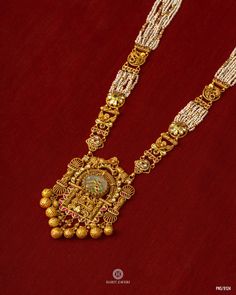 Baithak - Bridal Heritage’24 A graceful statement in 22kt gold, this antique heritage necklace, adorned with pearls, elevates your style effortlessly. Address: Harit Zaveri Jewellers, Ground Floor, Akshar Complex, Shivranjani, Ahmedabad - 15 Contact: +919023724779 22kt Gold | Diamond | Polki Bridal & Dailywear Jewellery Follow @haritzaverijewellers_dailywear for Daily Wear Gold & Diamond Jewellery. Experience the Promise of Right Price on every shopping experience at Harit Zaveri Jewell... Gold Neckless Jewelry, Mangalsutra Designs, Gold Diamond Jewelry, The Promise, Diamond Jewellery, Ahmedabad, Ground Floor, Chain Bracelet, Chains Necklace