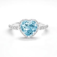 ITEM INFORMATION Gemstone:  * Aquamarine & Diamond Aquamarine:  * Option 1: 0.65 carats * Option 2: 1.05 carats * Cut: Heart Diamonds:  * Grade: VS - VVS  / G * Cut: Round Ring dimensions: * Option 1: 8x8mm  (Including diamond halo)  * Option 2: 10x10mm (Including diamond halo) Metal: * 18K White Gold Also available in: * Different Dimensions & Gemstones * 18K Yellow Gold & 18K Rose Gold * Platinum 950 Certification: * Complimentary certificate of authenticity * GIA certification available upon Diamond Heart Ring, Etsy Gold Ring, Black Diamond Ring, Round Rings, White Gold Ring, Diamond Halo, Gold Platinum, Diamond Heart, White Gold Rings