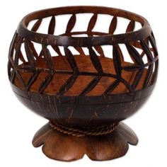 a wooden bowl sitting on top of a table