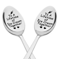 two spoons with words on them that read to a life time of ice cream together