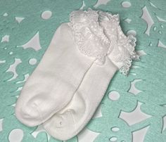 ♥ Girl's Soft White Lace Ankle Ruffled Socks. ♥ Perfect for ANY special occasion such as a wedding, First Communions, or just simply for everyday wear! They have a gorgeous double lace detail! ♥ 80% Combed Cotton, 17% Nylon, 3% Spandex ♥ Available Sizes: L, XL and XXL(as Shown) ♥ We offer a USPS Priority Mail shipping upgrade in our listings. Just add it to your cart if you need your order rush. Here is the link: https://www.etsy.com/your/shops/AmeliaSA22/tools/listings/section:29885881,stats:tr White Lace Socks, Girl White Socks, Socks Ruffle, Doll Socks, Lace Ankle Socks, Black Dress Shoe, Socks Lace, Ruffle Socks, School Shoe