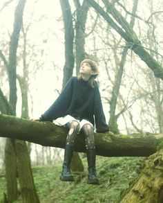 Woman In The Woods Photography, Sitting On A Log Reference, Moody Pose Reference, Sitting On Tree Branch Pose, Autumn Photoshoot Aesthetic, Hanging From Tree Pose Reference, Spooky Woods Photoshoot, Forest Pose Ideas, Forest Reference Photo