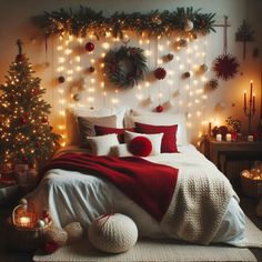 a bedroom decorated for christmas with lights on the headboard, bed and pillows in red and white