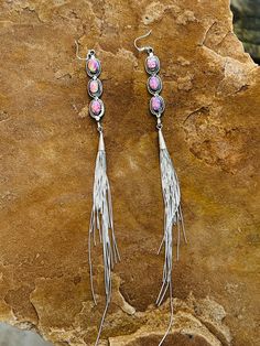 These Fringe Barbie Drop Earrings make any outfit stand out. Crafted from cultured pink, these fringe earrings are sure to add a dash of style to your wardrobe. An exciting take on traditional earrings, these pieces will help you make a statement. Sterling silver and made in the USA! Silver Dangle Earrings With Tassels, Silver Long Drop Earrings With Tassels, Linear Tassel Dangle Earrings, Long Drop Fringe Tassel Earrings, Pink Linear Earrings For Pierced Ears, Silver Fringe Drop Earrings, Silver Fringe Bohemian Earrings, Bohemian Silver Fringe Earrings, Silver Bohemian Fringe Earrings