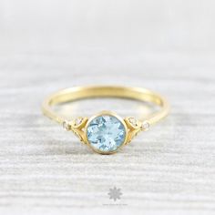 ♦ Main Stone: Moissanite/CZ ♦ Size: 0.85CT (6 mm) ♦ Cut: Brilliant Round Cut ♦ Shape: Round ♦ Color: Blue / Aquamarine ♦ Ring Metal: Sterling Silver/10K Gold/14K Gold/18K Gold ♦ Nickle Free ♦ Free Shipping to the United States ✥ O T H E R ∙ I N F O R M A T I O N ✥ ♦ Due to every item in our shop is made to order we are open for moderate customization on demand. Contact us prior to the order. ♦ Your item will be nicely packed to gift in elegant jewelry boxes. ♦ Some pictures show the listed engag Blue Aquamarine Ring, Dainty Engagement Rings, Promise Rings For Her, Flower Leaf, Leaf Ring, Aquamarine Stone, Aquamarine Rings, Vintage Engagement, Blue Gemstones