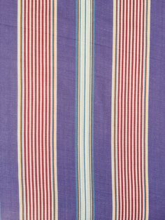 purple and red striped fabric with vertical stripes