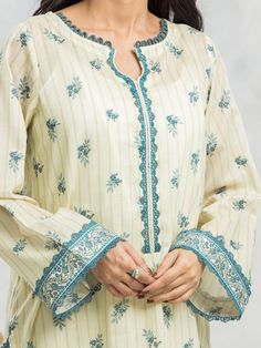 Brand: edenrobe Product: EWU24A1-29471-3PCollection: Allure Lawn Unstitched - Spring Summer CollectionFabric: Lawn DESIGN DETAILS: 3M Printed Lawn Shirt 2.5M Printed Lawn Dupatta 1.8M Dyed Trouser DISCLAIMER:* Lining, Laces, and Tassels are not included in unstitched variants.* Embellishment items in stitched outfits are subject to market availability.* The actual colors of the outfit may vary from the colors being displayed on your device. CARE INSTRUCTIONS: Extra Fabric Has Been Used For Shoot Original Color May Vary Slightly From The Picture Dry Clean Recommended Iron The Clothes At Moderate Temperature Do Not Use Bleach, Or Stain Removing Chemicals Damp Fabric Should Not Be Exposed To Sunlight edenrobe Allure Lawn Spring Summer Collection Authenticity Guaranteed – 100% Original Brand 3 Lawn Design, Kurti Designs Latest, Lawn Shirts, Lawn Suits, Spring Summer Collection, Extra Fabric, Fabric Stores Online, Jacquard Fabric, Designer Suits