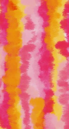 an orange, pink and yellow tie dye pattern