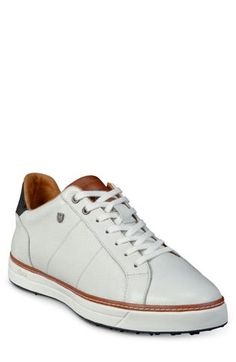 Minimal styling gives work-to-weekend versatility to this elevated sneaker in premium leathers that's grounded by a durable Vibram® sole. Lace-up style Leather upper and lining/rubber sole Made in the USA Modern Leather Low-top Golf Shoes, Custom Leather Lace-up Sneakers With Ortholite Insole, Classic High-top Walking Sneakers, Classic High-top Sneakers For Walking, Leather Lace-up Golf Shoes With Abzorb Midsole, Leather Golf Shoes With Abzorb Midsole, Casual Leather Golf Shoes With Abzorb Midsole, Lace-up Leather Golf Shoes With Abzorb Midsole, Classic Leather Low-top Golf Shoes