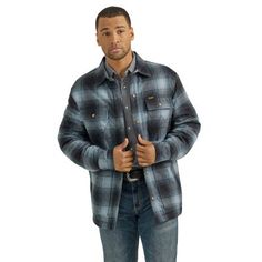 No winter wardrobe is complete without some sherpa to help you shake off the cold. Luckily, our men's sherpa-lined flannel shirt jacket is up to the task and ready to exceed every expectation. Combining the best of both worlds, this versatile layer looks just like your favorite flannel shirt but it has the heavyweight warmth of sherpa to keep you warm when the weather takes a turn for the worse. It's crafted from 100% cotton for easy care and long-lasting quality. It also comes with two flap chest pockets with snaps, lower pockets, and a full snap closure. Regular Fit Long Sleeves Sherpa Lining Chest Pockets Classic "W" Stitching 100% Cotton Winter Flannel Shacket For Outdoors, Winter Outdoor Flannel Shacket, Rugged Long Sleeve Flannel Shirt For Winter, Rugged Long Sleeve Winter Shacket, Winter Rugged Long Sleeve Shacket, Winter Flannel Outerwear With Relaxed Fit, Winter Relaxed Fit Flannel Outerwear, Winter Outerwear In Flannel With Relaxed Fit, Lined Flannel Shirt