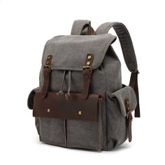 Canvas Backpack Travel Backpack Weekender Backpack We use selected full grain leather, quality canvas material, anti-rust hardware, and to make the bag as good as it is. This bag is perfect as your everyday bag, which can fit a 15'' Laptop, an IPAD, A4 files, books, magazines, as well as many accessories. Features: 1. Inside an anti-shock laptop sleeve for laptops 2. Large storage spaces including the main compartment 3. Inside zipper pocket, cell pocekt, purse pocket, laptop sleeve Specifications: Dimensions: 13'' L/16.5''H/6''W (33cm/42cm/15cm) Color: Khaki/Grey/Black/Army Green Processing Time: 1-3 business days Shipping Time:Standard Shipping: 20-30 Days (there maybe some more days delay because of global epidemic effect)Fast Shipping: 5-7 Days Casual Canvas Leather-trimmed Backpack, Brown Coated Canvas Backpack, Everyday Leather-handled Coated Canvas Backpack, Coated Canvas Backpack With Zipper Closure For On-the-go, Travel Backpack With Zipper Pocket, Canvas Material, Water Resistant Backpack, Waxed Canvas Backpack, Canvas Backpack, Waxed Canvas