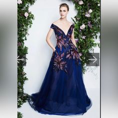 Gorgeous Gown With Beaded Flower Appliqu . It Was Worn Once And The V-Neck Was Tailored To Be Higher. Retails For $2500, Selling For $800. Blue Floral Embellished Evening Dress For Gala, Blue Floral Embellished Evening Gown, Blue Floral Embellished Gown For Gala, Blue Floral Embroidery Evening Dress, V-neck Floral Embroidered Evening Dress For Prom, V-neck Evening Dress With Floral Embroidery For Prom, Floral Embroidered V-neck Evening Dress For Prom, Floral Embroidered V-neck Prom Evening Dress, Blue Floral Embellished Floor-length Evening Dress