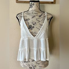 Pol White Boho Sleeveless Crop Top Size Small. Gorgeous Little Top! Nwot Excellent Condition. Adjustable Straps Deep V Neck Crop Length Crisp White Color Waffle Pattern Cotton Sleeveless Halter Top, Chic Cami Vest For Beach, Chic Beach Vest In Camisole Style, Summer Beach Halter Top Vest, Chic Beach Vest Camisole, Chic Camisole Vest For Beach, Chic Camisole Vest For The Beach, White Sleeveless Summer Vest, Summer White V-neck Vest