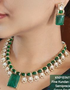 Green Kundan set is inspired by Sabyasachi and features Polki Jadau craftsmanship. The double-layered, gold-plated necklace boasts Emerald Moissanite Polki diamonds, creating a stunning statement piece. Perfect for gifting, this luxurious necklace embodies the rich heritage and artistry of India. *𝐏𝐑𝐎𝐃𝐔𝐂𝐓 𝐃𝐄𝐓𝐀𝐈𝐋* * Material: Brass * Plating: Gold Plated. * Stone: Semi Precious Kundan, Polki, Stones & Emerald. *𝐃𝐈𝐒𝐂𝐋𝐀𝐈𝐌𝐄𝐑* Product color may slightly vary due to photographic Designer Kundan Gold Necklaces, Designer Gold Kundan Necklace For Festive Occasions, Festive Designer Gold Kundan Necklace, Designer Kundan Gold Necklace, Yellow Gold Necklaces With Meenakari For Reception, Yellow Gold Meenakari Necklaces For Receptions, Designer Gold Necklaces For Festive Season, Designer Gold Necklace For Festive Occasions, Elegant Yellow Gold Meenakari Necklace