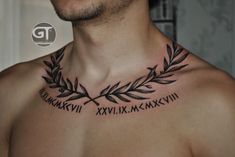 a man with a tattoo on his chest that has roman numerals and an olive branch