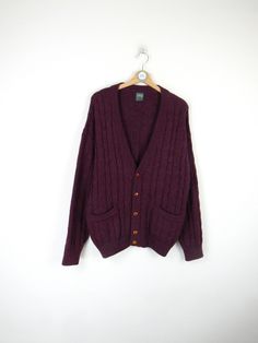 Think Pink vintage 90s cardigan, wine color 25% Alpaca - 25% Wool - 50% Acrylic Made in Italy Size L Measures Shoulder width: 62 cm Sleeve length: 52cm Chest width: 57 cm Length: 73cm Condition: PERFECT - No signs of wear Our garments are all vintage and second hand. Any signs of wear or defects are documented with photos and description. For any questions, photos, videos we are at your disposal.🌈 Pink Casual V-neck Cardigan, Vintage Pink Knit Cardigan, Pink Knit Button-up Cardigan, Pink V-neck Acrylic Cardigan, Alpaca Cardigan, Red V-neck Cardigan With Pockets, Wine Colored, Vintage Pink, Alpaca