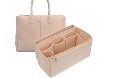 two purses are shown with the handles open and one has compartments for pens in it