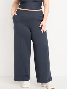 elasticized waist hip pockets seamed front leg pockets fit your phone go-dry wicks moisture pull-on style sits at belly button loose hip and thigh wide leg 30 1/2" regular inseam 28 1/2" petite inseam 33 1/2" tall inseam models are approx.  5'9" and wear sizes s (4), l (12), and xl (18)machine wash according to the care instruction label Comfort Stretch Straight Yoga Pants With Elastic Waistband, Comfort Stretch Yoga Pants With Elastic Waistband, Solid Bottoms With Hip Pockets And Comfort Stretch, Comfort Stretch Solid Bottoms With Hip Pockets, Relaxed Fit Yoga Bottoms With Pockets, Solid Color Bottoms With Comfort Stretch And Hip Pockets, Athleisure Solid Color Straight Pants, Solid Color Straight Pants For Athleisure, Straight Pants For Athleisure