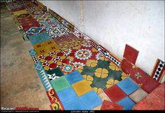 colorful tiles on the floor in an old building