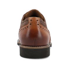 A room-commanding derby with brogue details the Covington by Thomas & Vine. This comfortable genuine leather oxford dress shoe features an elastic gusset and an ExtraLight� outsole lined with a 6 mm Tru Comfort Foam� footbed. Classic wingtip details top the look. Semi-formal Cognac Oxfords With Brogue Detailing, Brown Oxfords With Brogue Detailing For Derby, Cognac Wingtip Oxfords For Business Casual, Cognac Leather Shoes With Brogue Detailing For Derby, Leather Lined Oxfords With Round Toe, Brown Brogue Oxfords For Derby, Cognac Leather Brogue Shoes For Derby, Leather Oxford Shoes With Rubber Sole For Derby, Cognac Oxfords With Rubber Sole For Derby