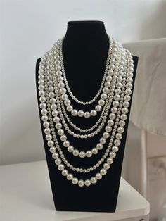 Multi-layer pearl necklace, made of high-quality imitation pearls of different sizes Necklace  ->  Necklace Quality -> Daily Shower, Not Fade, Not Allergic Order Make Time -> 10-15 days (Important holiday, time will be extended by 1-3 business days) Pearl Necklace Bridal, Long Pearl Necklace, Layered Pearl Necklace, Pearl Beaded Necklace, Friends Gifts, Long Pearl Necklaces, Necklace Bridal, Multi Layer Necklace, Layer Necklace