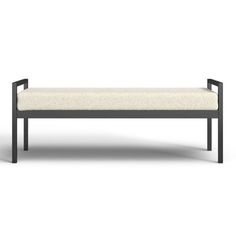 the bench is made from metal and has a white upholstered cushion on it