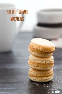 a stack of cookies sitting on top of a wooden table