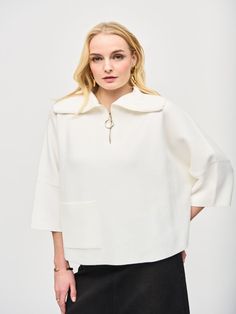 Experience casual luxury in this Joseph Ribkoff cutaway neckline top. It has a distinctive oversized fit, combined with an enticing short length that provides a modern appeal. The unique 3/4 dolman sleeve detail and plain pattern are elegantly simple, while the added zipper element grants it an edge for your everyday attire. Beach Wedding Black, Sweater Fabric, Wedding Dress With Veil, Long Sleeve Dress Formal, Dolman Top, Zip Collar, Jacquard Sweater, Viscose Rayon, Joseph Ribkoff