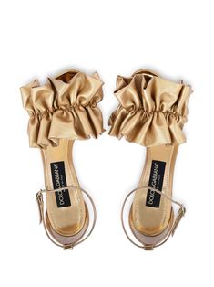 Luxury Gold Sandals With Buckle Closure, Designer Gold Ankle Strap Sandals, Designer Gold Sandals With Ankle Strap, Elegant Summer Sandals With Ruffles, Chic Open Toe Sandals With Ruffles, Evening Sandals With Ruffles For Spring, Spring Evening Sandals With Ruffles, Summer Party Sandals With Ruffles, Designer Gold Sandals With Wrapped Heel