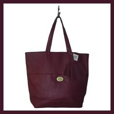 Coach Tote Handbag Dust Bag An Care Instructions Included Can Easily Fit Laptop An Other Personal Items. Genuine Leather Pretty Red/Burgundy Color, Magnetic Top Closure Exterior Has Front Slip Pocket With Gold Tone Closure Interior Has 2 Slip Pockets An A Zip Closure Burgundy Shopping Bags, Burgundy Tote Bags For On-the-go, Burgundy Shoulder Bag For Shopping, Burgundy Tote Shoulder Bag For Errands, Coach Hobo Tote Bag For On-the-go, Burgundy Satchel With Handles For Shopping, Burgundy Tote Bag For Travel, Burgundy Tote Bag For Shopping, Burgundy Double Handle Shopping Bags