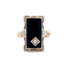 an antique black onyxite and diamond ring