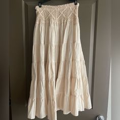 Beautiful Handmade Long Skirt Bought In Thailand, Never Used It Bohemian Beige Skirt With Elastic Waistband, Beige Bohemian Skirt With Elastic Waistband, Bohemian Cream Lined Skirt Bottoms, Casual Cream Maxi Skirt, Cream Flowy Bohemian Skirt, Cream Cotton Maxi Skirt, Cream Tiered Skirt For The Beach, Cream Flowy Skirt For Vacation, Cream Tiered Beach Skirt