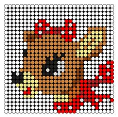 a cross - stitch pattern of a teddy bear wearing a santa hat