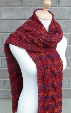 "This beautiful hand knitted scarf is made with Super Bulky and Soft Wool Blend Yarn (80% Acrylic, 20% Lambswool). Classic cable pattern The scarf can be worn in multiple ways. Very beautiful colors: shades of wine red, olive green, yellow, and blue. It is hard to show them in a picture. There is NO bright blue color in the scarf, just medium blue. The colors may appear slightly different on different monitors. Measures: 67\" (170 cm) long x 7\" (18 cm) wide. MORE COLORS are here: https://www.et Red Knitted Scarf For Fall, Red Knitted Fall Scarf, Red Knitted Fall Scarves, Red Hand Knitted Scarf One Size, Red Hand Knitted Scarves One Size, Red Yarn Knitting Pattern, Hand Knitted Red Yarn Knitting Pattern, Red Hand Knitted Yarn Knitting Pattern, Cozy Red Knitting Pattern