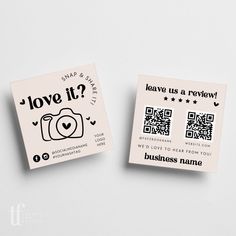 two small business cards sitting next to each other