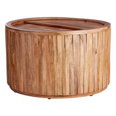 a round wooden table with an open lid