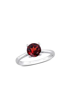 Make a stunning statement of style with this brilliant ring crafted with a solitaire garnet. Total garnet weight: 1.60ct. Sterling silver/garnet Imported Classic Garnet Round Cut Ring, Classic Garnet Ring With Round Cut, Classic Garnet Rings With Round Cut, Classic Solitaire Ring With Lab-created Ruby, Classic Garnet Round Band Rings, Classic Garnet Ring With Round Band, Fine Jewelry Garnet Solitaire Ring, Red Garnet Solitaire Ring, Elegant Garnet Solitaire Birthstone Ring