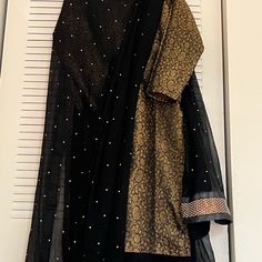 Black Chiffon Sharara With Poth Shirt Chiffon Stone Work Dupatta Very Elegant Dress Black Silk Dress With Sheer Sleeves, Black Long Sleeve Georgette Dress, Black Georgette Dress For Festive Occasions, Black Dress With Sheer Dupatta And Traditional Drape, Black Evening Dress With Dupatta, Anarkali Black Silk Dupatta, Black Silk Anarkali Dupatta, Black Anarkali Dress With Sheer Dupatta, Traditional Black Dress With Sheer Dupatta