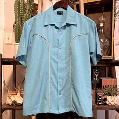 Brand New With Tag. Size Large Light Blue Cotton Top With Placket, Light Blue Cotton Tops With Placket, Light Blue Cotton Shirt With Camp Collar, Blue Top With Camp Collar And Placket, Vintage Light Blue Button-up Tops, Light Blue Vintage Button-up Tops, Classic Blue Camp Collar Top, Male Shirt, Bowling Shirt