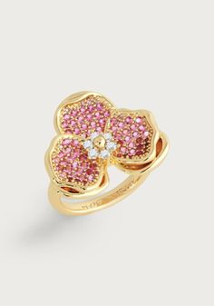 This ring is crafted from 18k gold dipped brass and encrusted with hundreds of hand set, sparkling crystals. This highly feminine and bold jeweled ring is intricately detailed and makes an elegant statement for any occasion. Orchid Ring, Orchid Jewelry, High Jewelry Ring, Luxe Jewelry, Cubic Zirconia Rings, Pave Ring, Jewel Box, Gold Dipped, Pink Stone