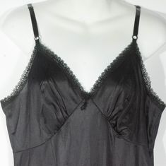 Here's a late 1970's / early 80's SEARS black slip dress that is in great condition with a sweet high waist and neckline. **PLEASE NOTE** The interior camera lens had spots: There are no spots or stains on this slip. This full lingerie slip has adjustable shoulder straps, fitted bodice top and skirt slip to the knee lower half that's trimmed in triplet panel lace. Darling! The original Sears label says it's a size 38 and laid-flat measurements are included here for you to check your fit. This is Vintage Slip, Bodice Top, Vintage Slips, Black Slip Dress, Vintage Wardrobe, 70s Vintage, Pin Up Style, Fitted Bodice, Up Styles